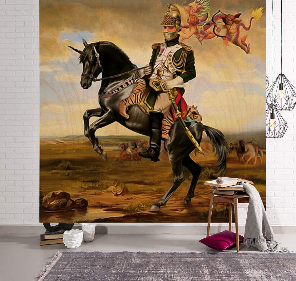 a man on a horse jumping over a box